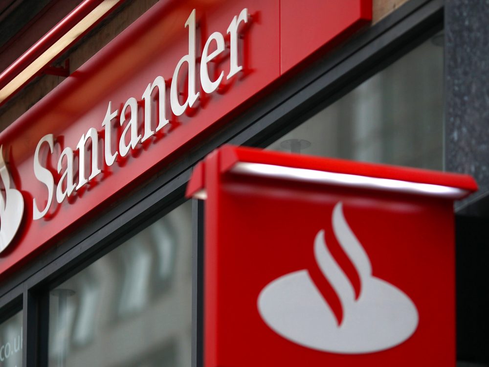 A sign hangs from a branch of Banco Santander in London, U.K., on Wednesday, Feb. 3, 2010. Banco Santander announce FY earnings tomorrow.  Photographer: Simon Dawson/Bloomberg via Getty Images